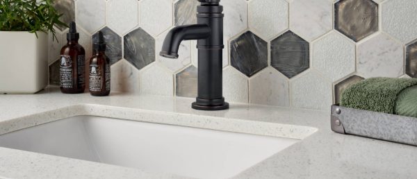 Sparkling White Quartz Countertop in Bathroom Sink